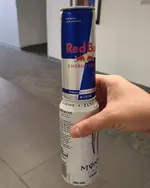 a-can-of-a-red-bull-fits-perfectly-on-top-of-a-can-of-v0-cVjeT2qcbKvvgsvMzXA0R1UaKqAl_RysGmAF...webp