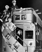 four-members-of-all-girl-musical-cabaret-getting-off-bus-at-5th-ave-and-96th-st-in-manhattan-1...jpg