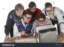 stock-photo-five-nerdy-guys-playing-on-old-fashioned-computer-they-are-enjoying-it-front-view-...jpg